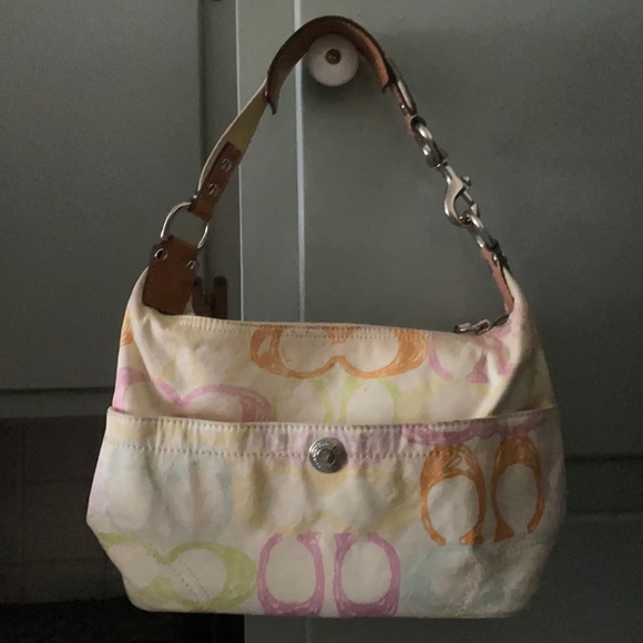 Coach Handbags - COACH Scribble white Muliticolor Monogram Bag 💞